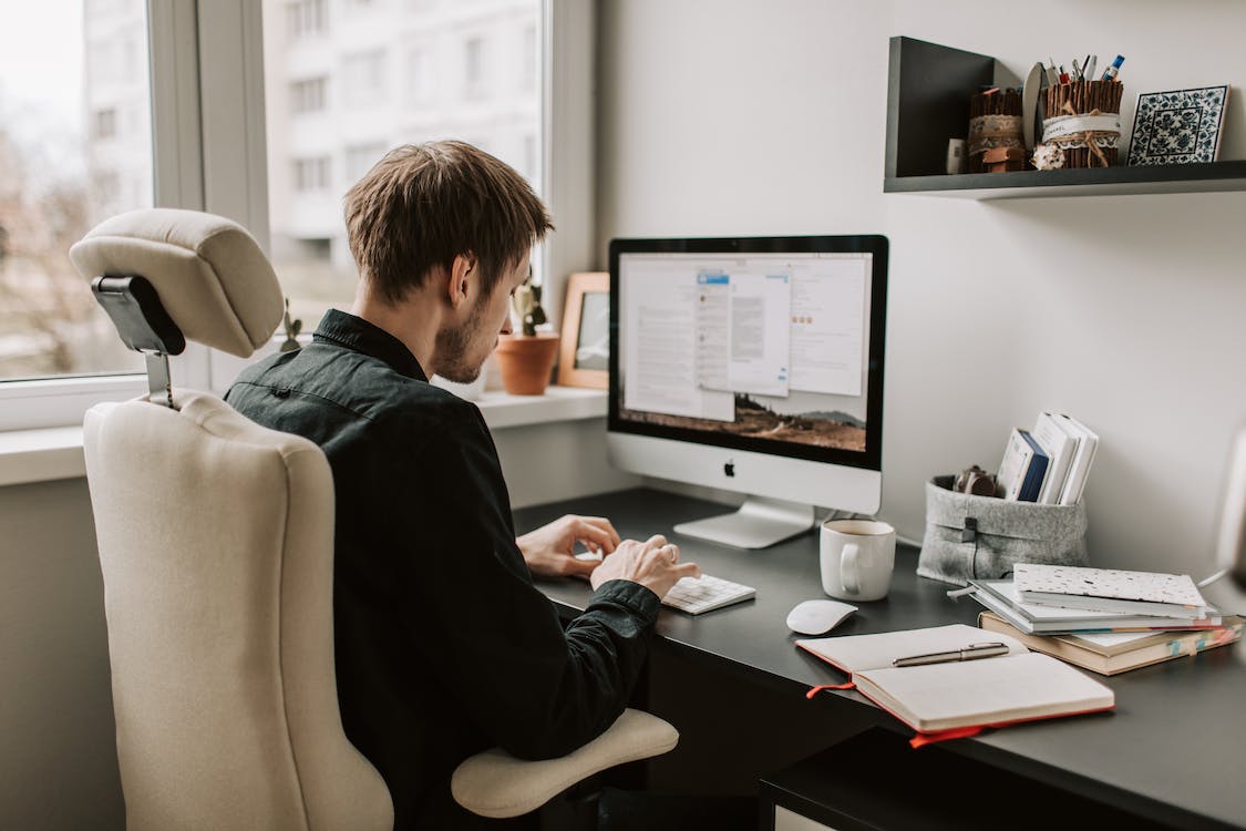 Free Photo Of Man Using Computer Stock Photo