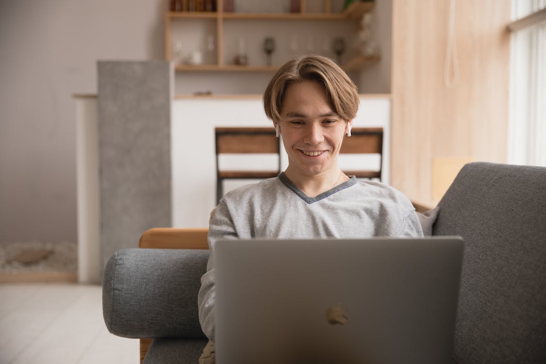 Free Photo Of Man Using Laptop Stock Photo